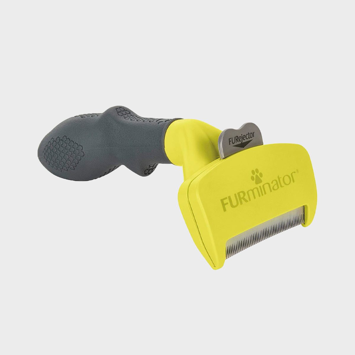 A yellow pet grooming tool with a black ergonomic handle, designed for de-shedding, labeled "FURminator" and "FURjector." Set against a plain background.