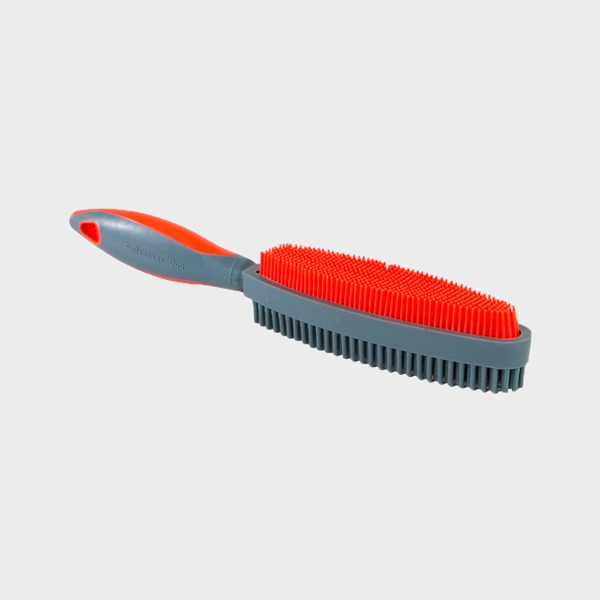 Brush with red bristles and gray handle positioned diagonally against a plain background. Text on handle reads "FurRemover Duo."