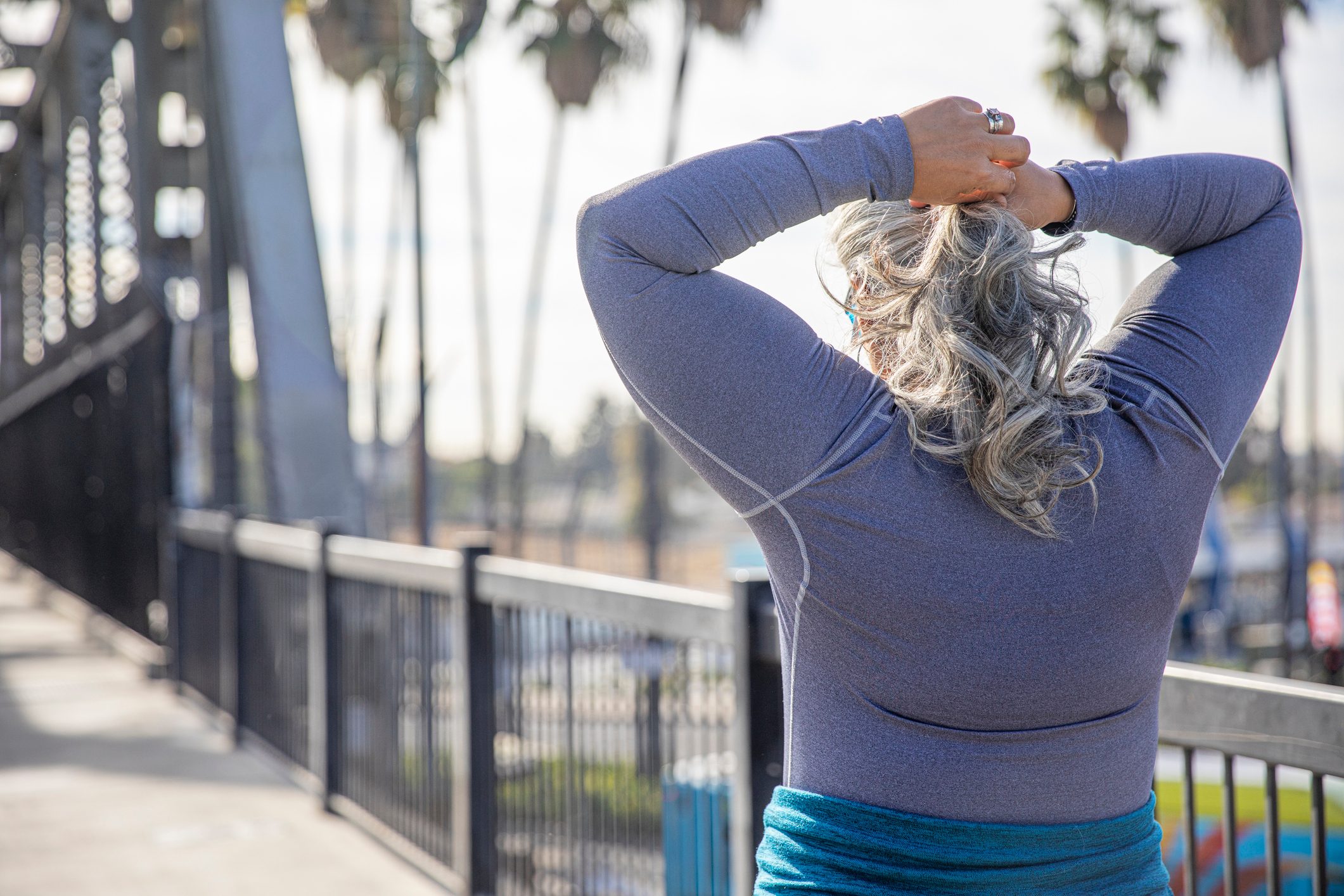 Senior Woman Fixing Hair