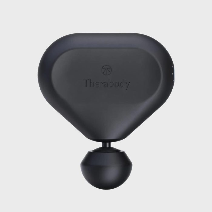 Massage device sits upright; the text 