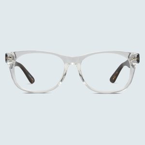 Clear eyeglasses resting against a plain light blue background, featuring black temple tips for contrast.