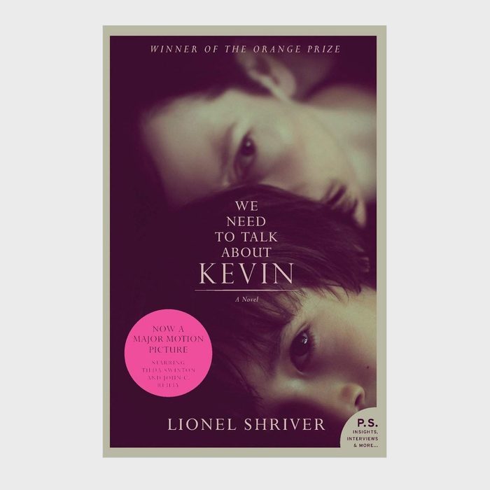 Two faces lie close together; one looking up. Dark, soft focus creates an intimate mood. Text: 