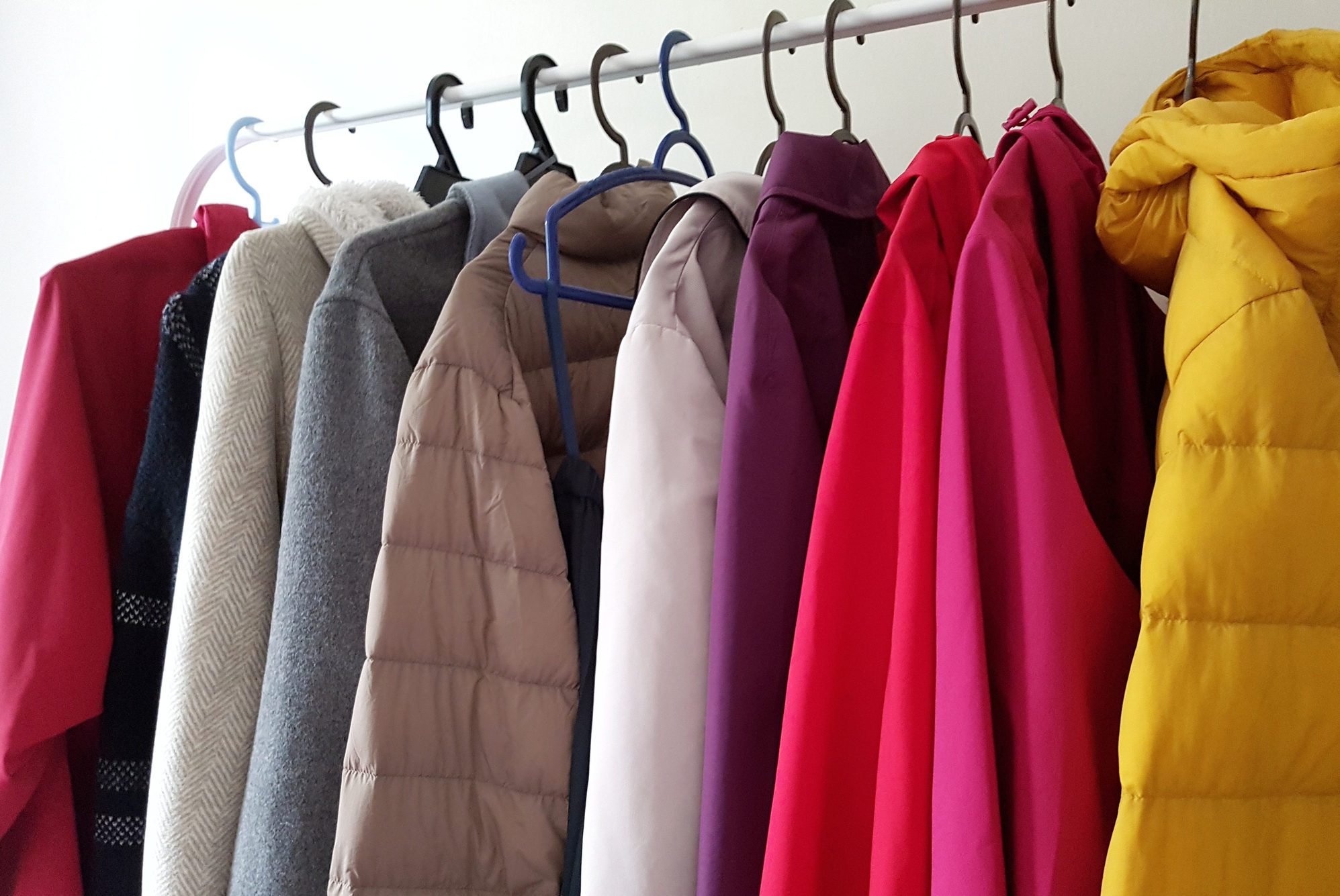 Clothes Hanging On Rack In Store