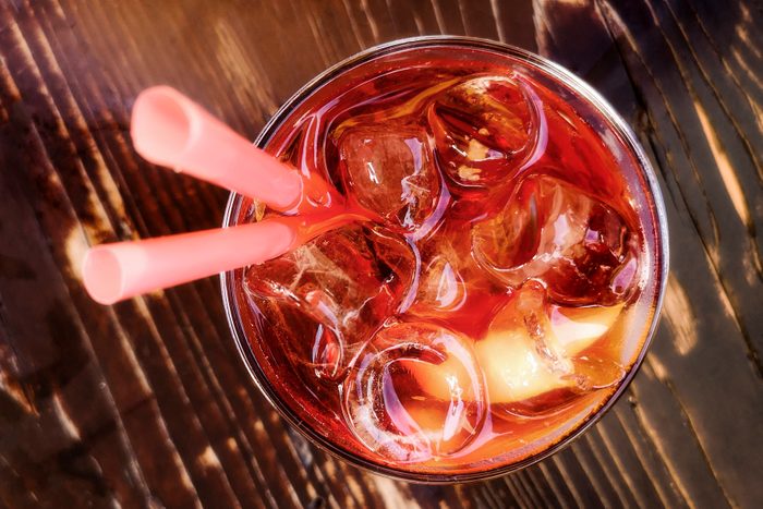 Negroni Cocktail On Top View With Wooden Background