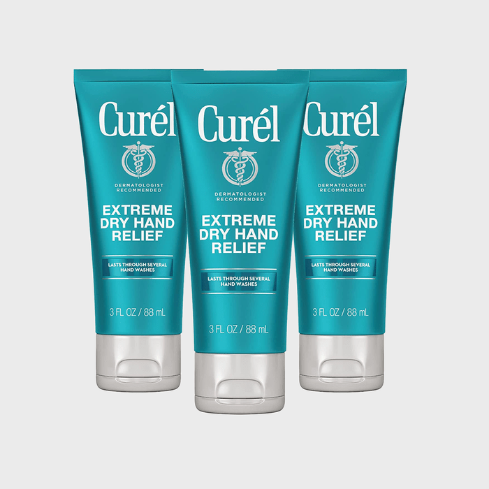 Three teal tubes display hand cream, reading 