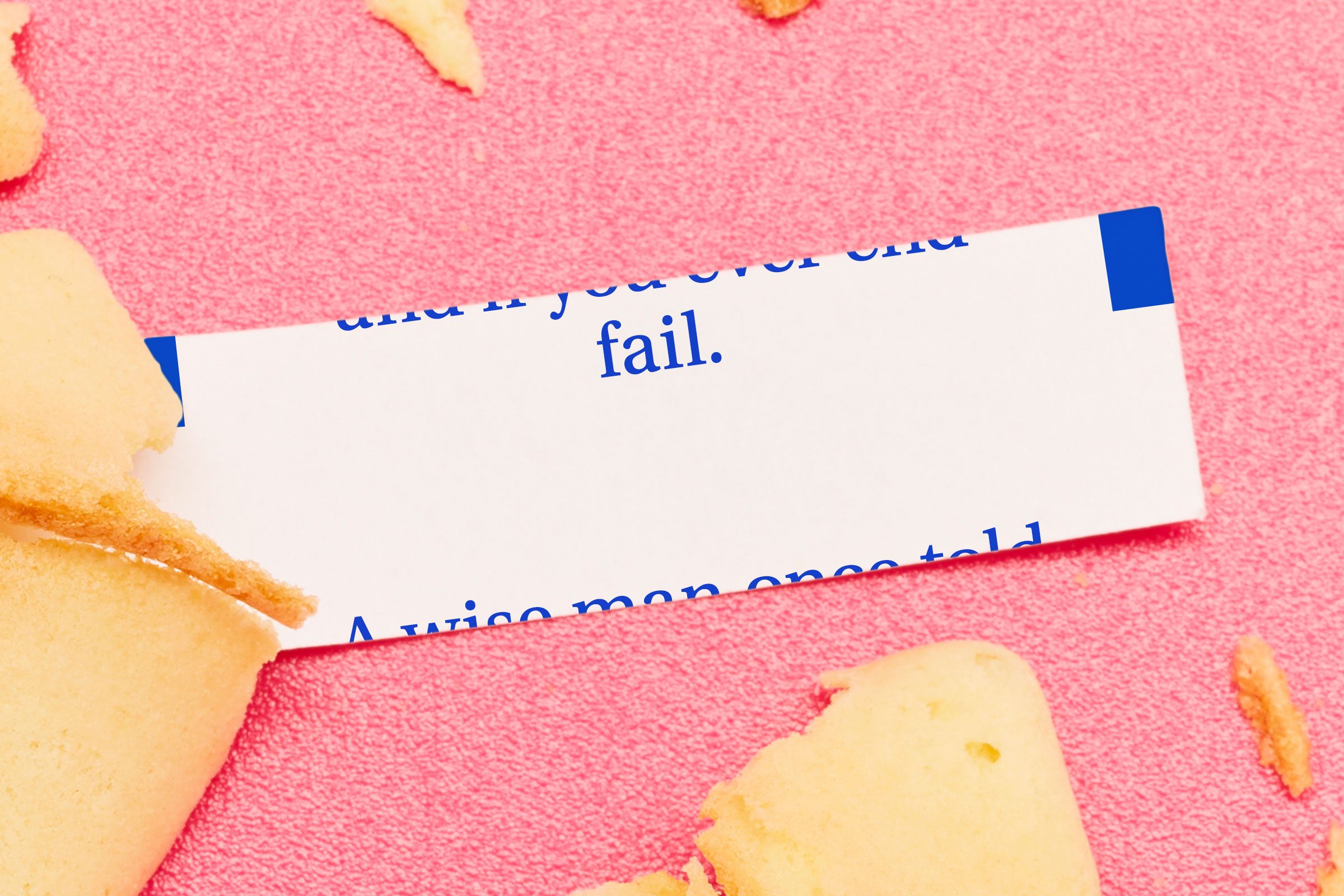 Fortune cookie with printing messed up so that you can only read the word "fail" and the rest is cut off.