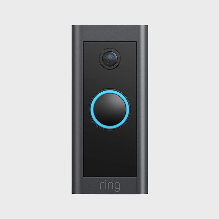 Doorbell camera sits idle, highlighted by blue ring, against a plain background with 
