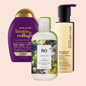 Three conditioner bottles stand side-by-side, showcasing brands: OGX, R+Co, and Shu Uemura against a soft beige background.