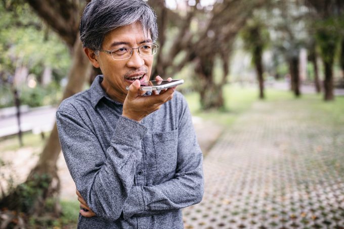 Senior man using a phone