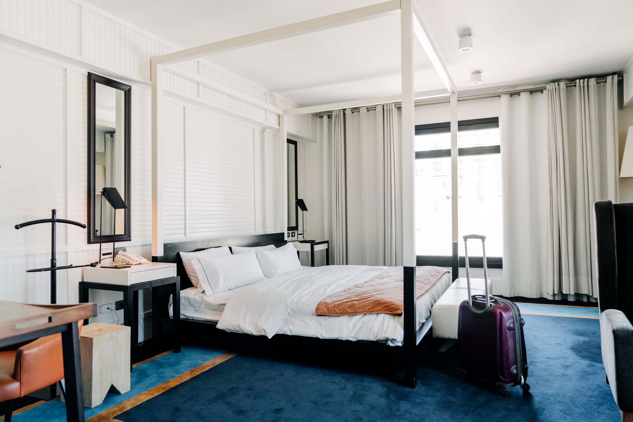 Interior of modern hotel bedroom