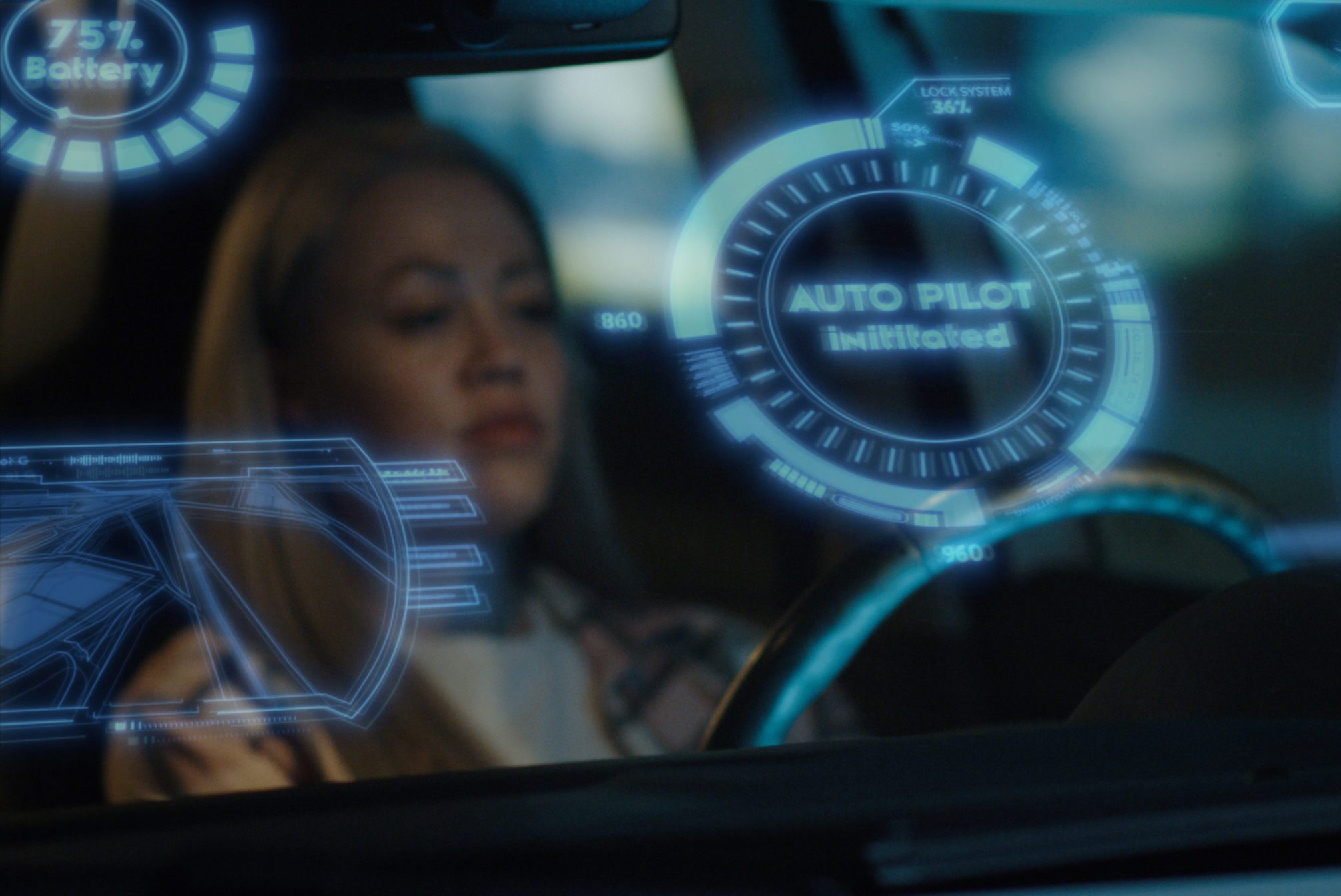 Dashboard displays "AUTO PILOT initiated," shows 75% battery; a person sits inside a dimly lit vehicle.