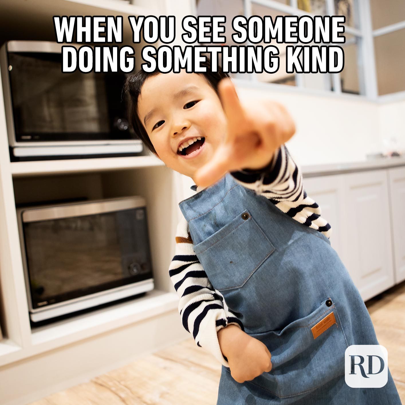 Child pointing at camera. Meme text: When you see someone doing something kind