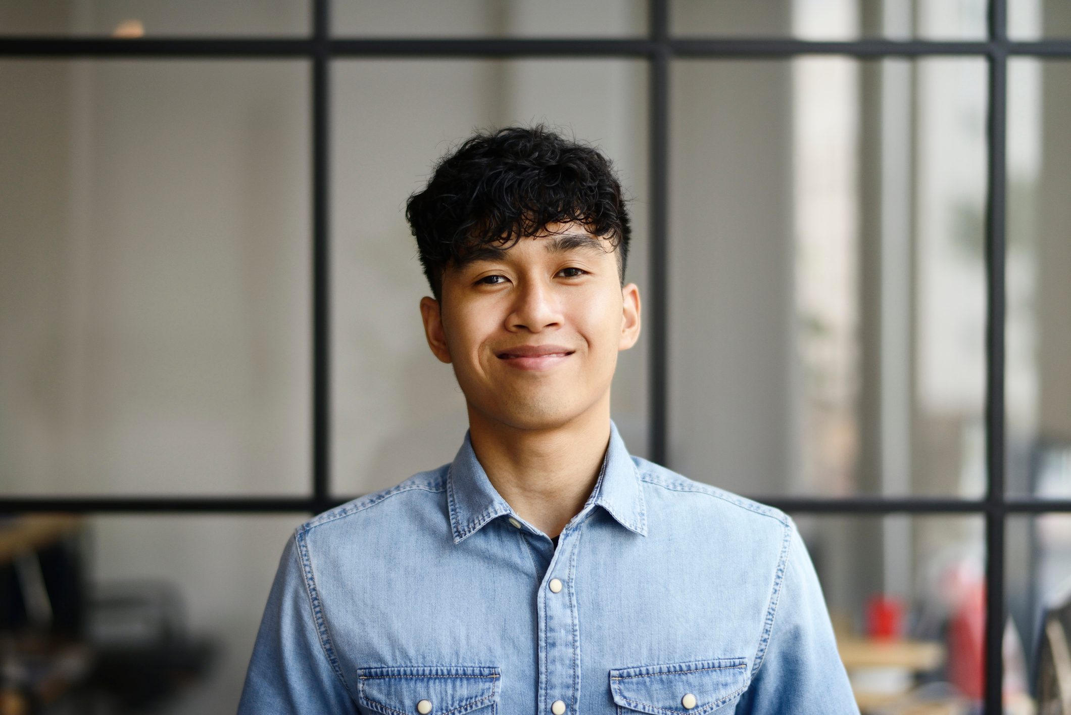 Portrait of a young man after a glow up