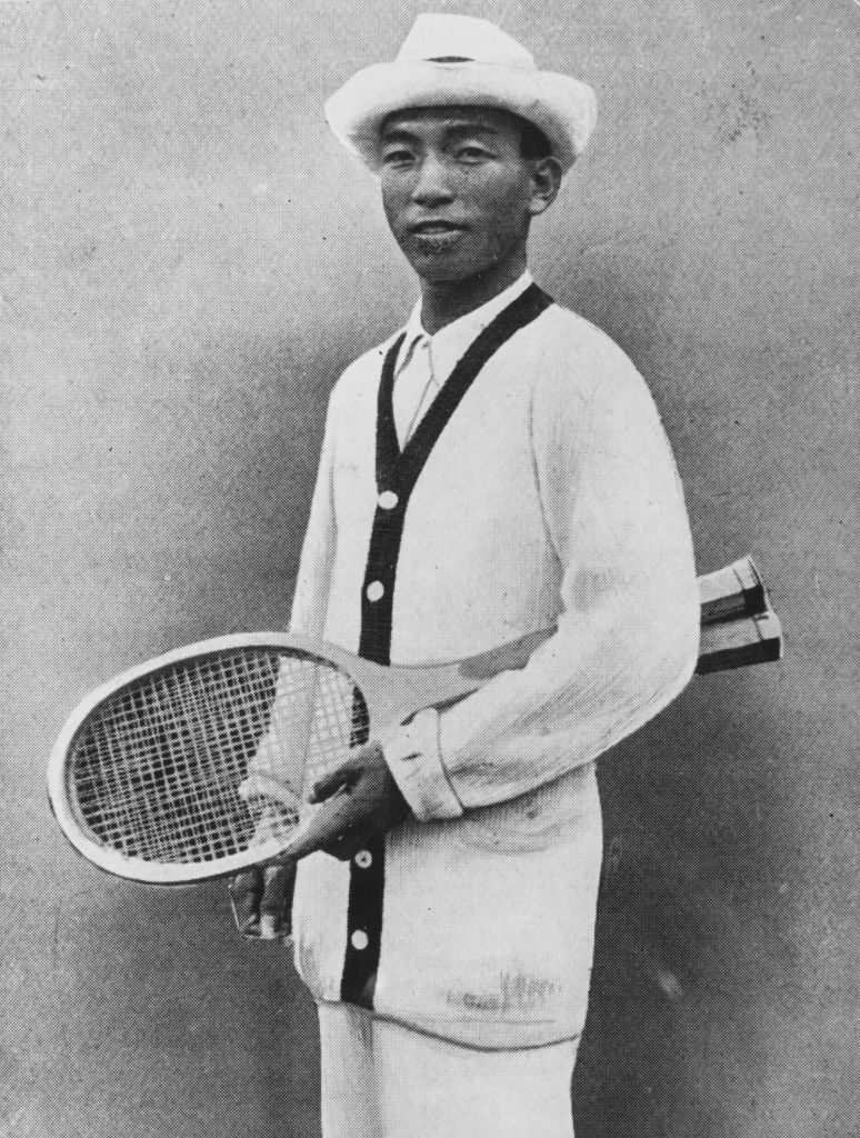 Zenzo Shimizu posing with his tennis racket