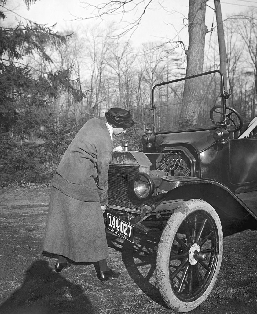 Lady Driver Cranking Her Car 1921