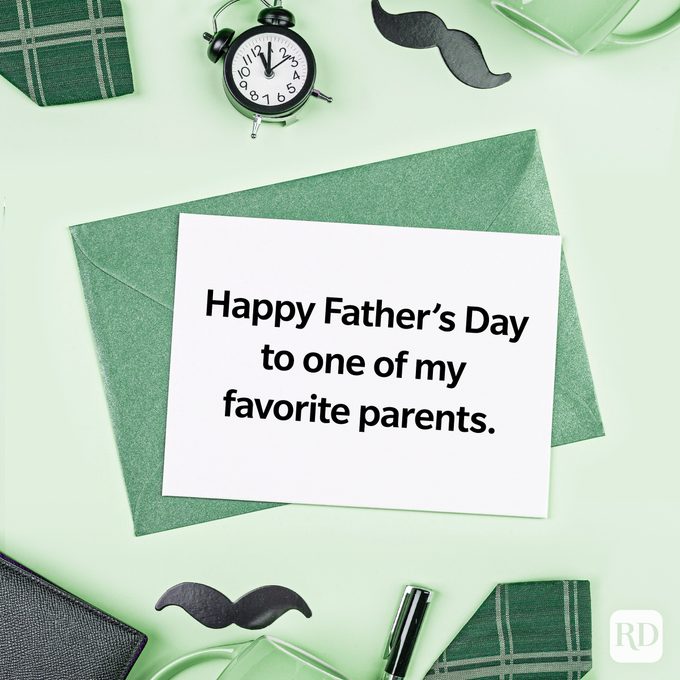 Card rests on a green envelope, surrounded by an alarm clock, mustache cutouts, and a plaid handkerchief. Text reads, "Happy Father's Day to one of my favorite parents."