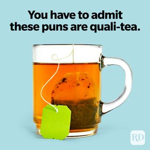 A glass mug holds steeping tea with a green tea bag, against a light blue background. Text reads: 