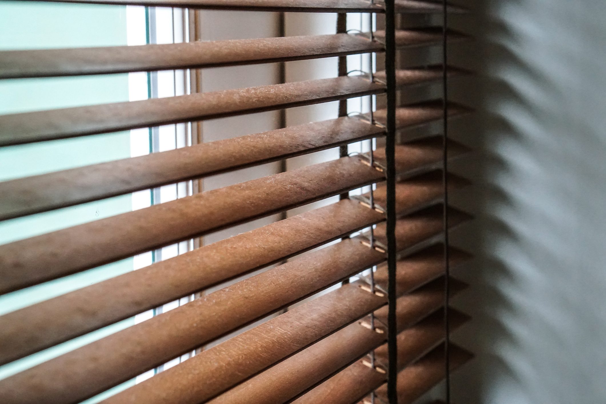 wood blind shade curtain and shadow