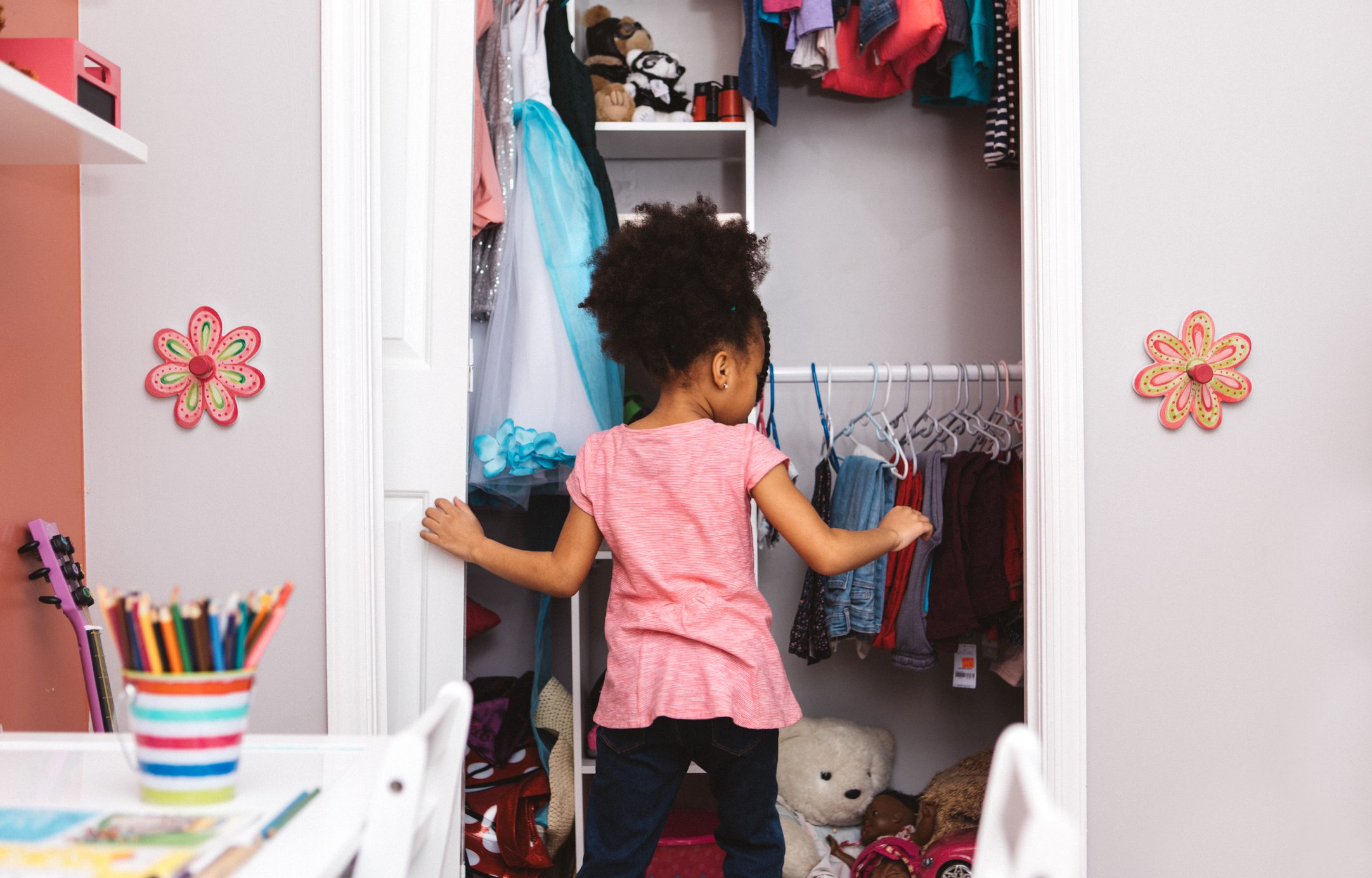 little girl getting ready for school