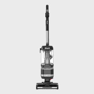 Vacuum cleaner stands upright, labeled 