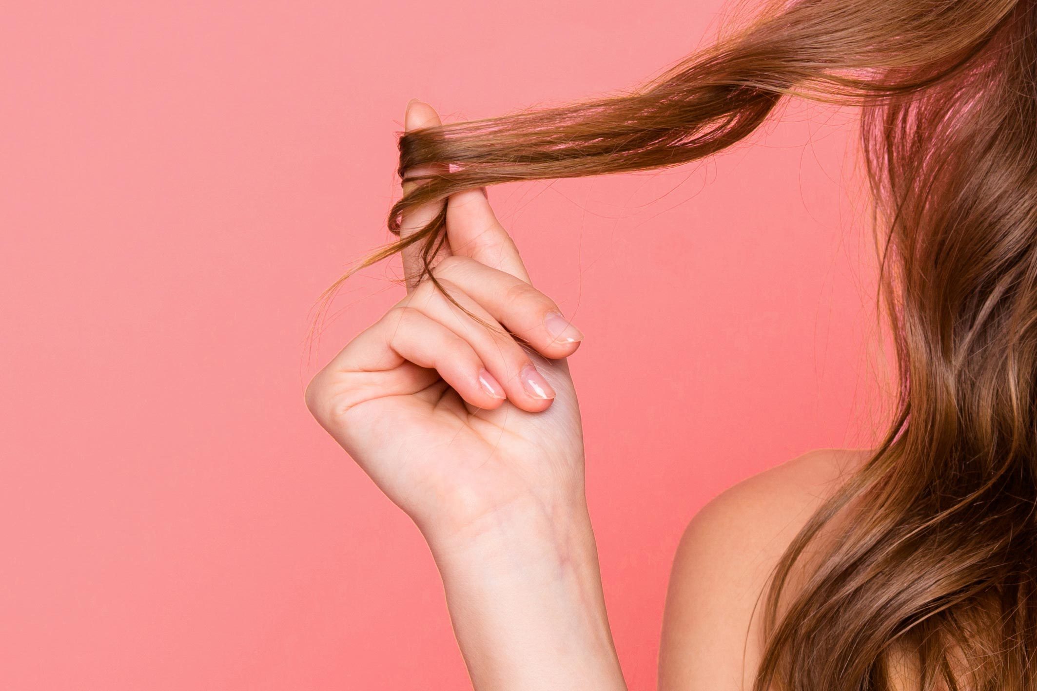 woman twirling hair on finger