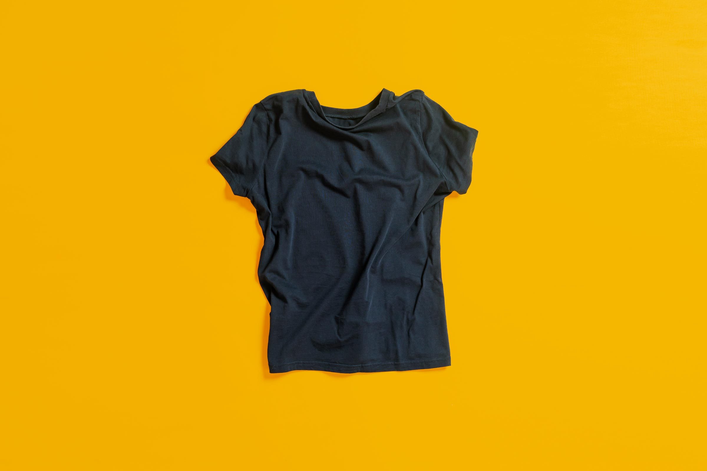 black shirt on yellow background