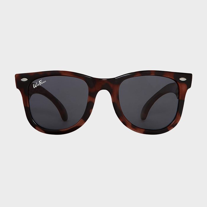 Tortoiseshell sunglasses with dark lenses displayed on a plain white background. The frame features labeled text: 
