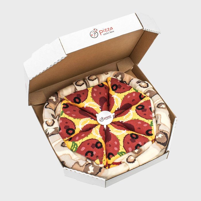 Socks designed as a pizza, arranged like slices, rest in an open cardboard box labeled 