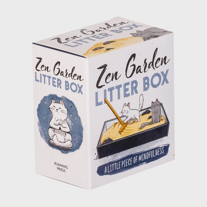 Box displays a whimsical cat inside a mini Zen garden litter box, surrounded by playful typography and illustrations. Text reads: 