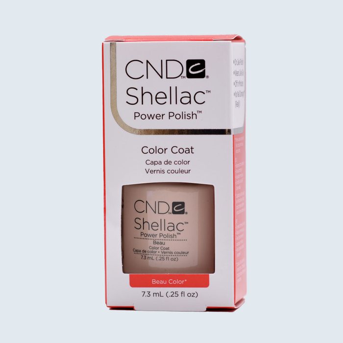 Nail polish bottle packaged in a white and red box labeled 