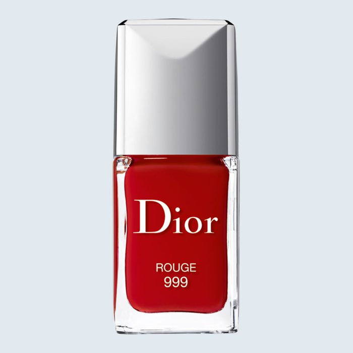 Red nail polish bottle labeled 