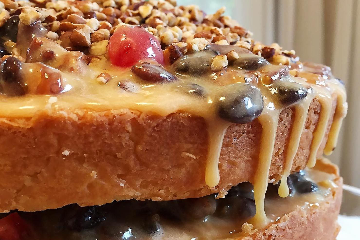 close up of layered Alabama lane cake with raisins