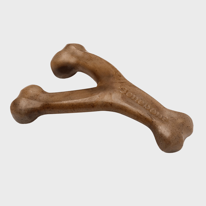 Brown, Y-shaped chew toy resting; marked 