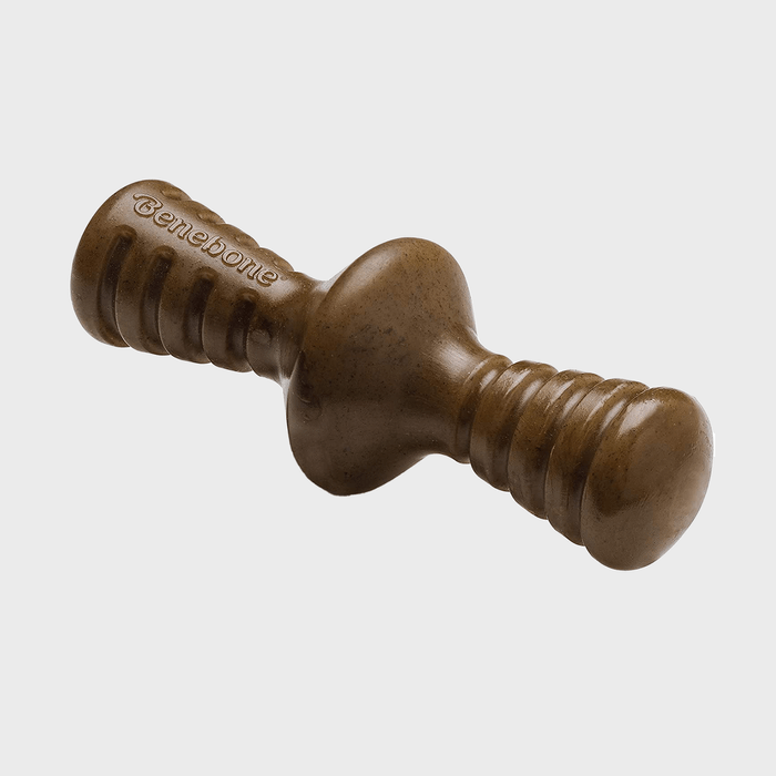 Brown chew toy lies angled on a white background, featuring textured grips and 
