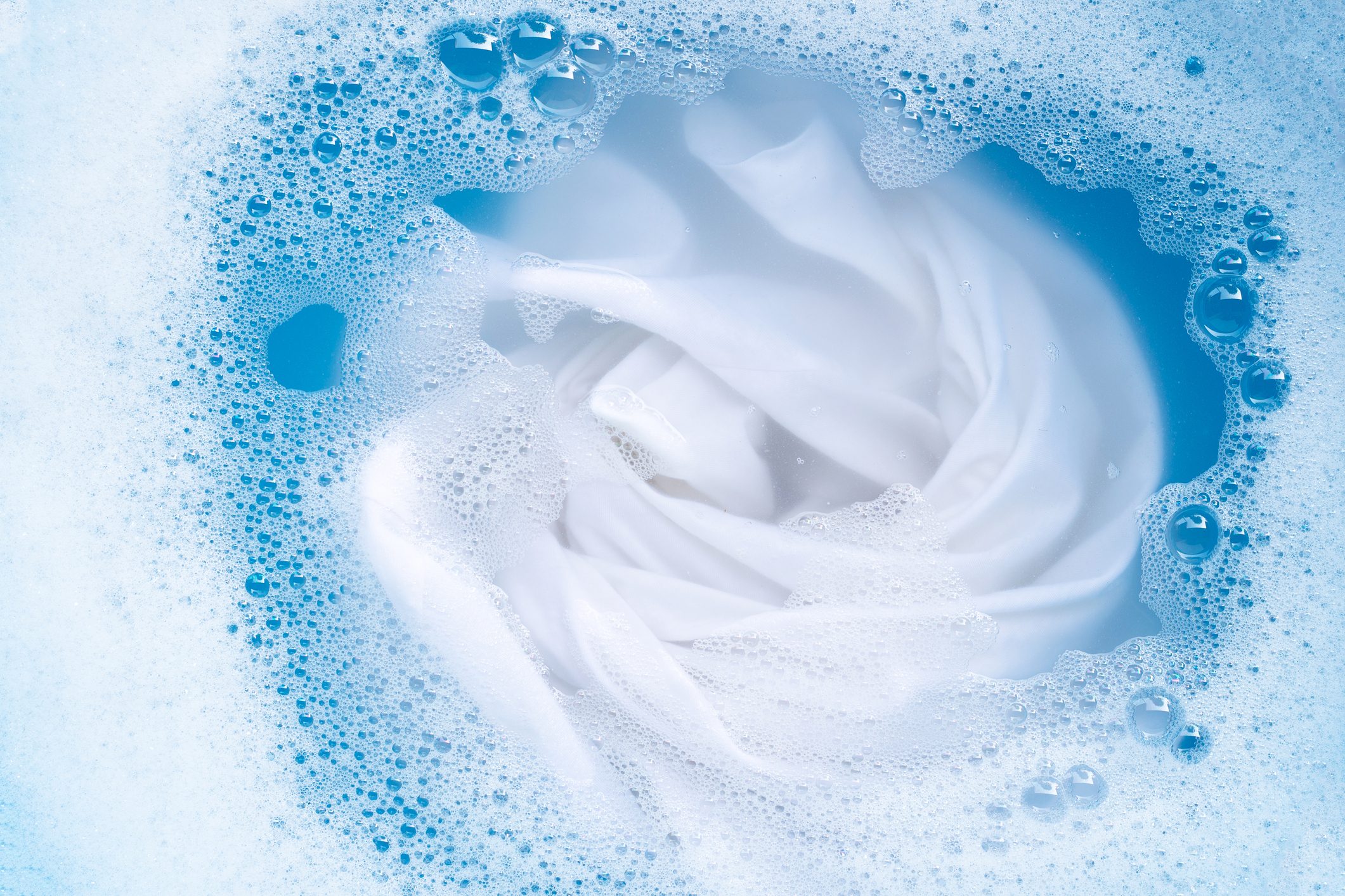 Close-Up Of Clothing In Washing Machine