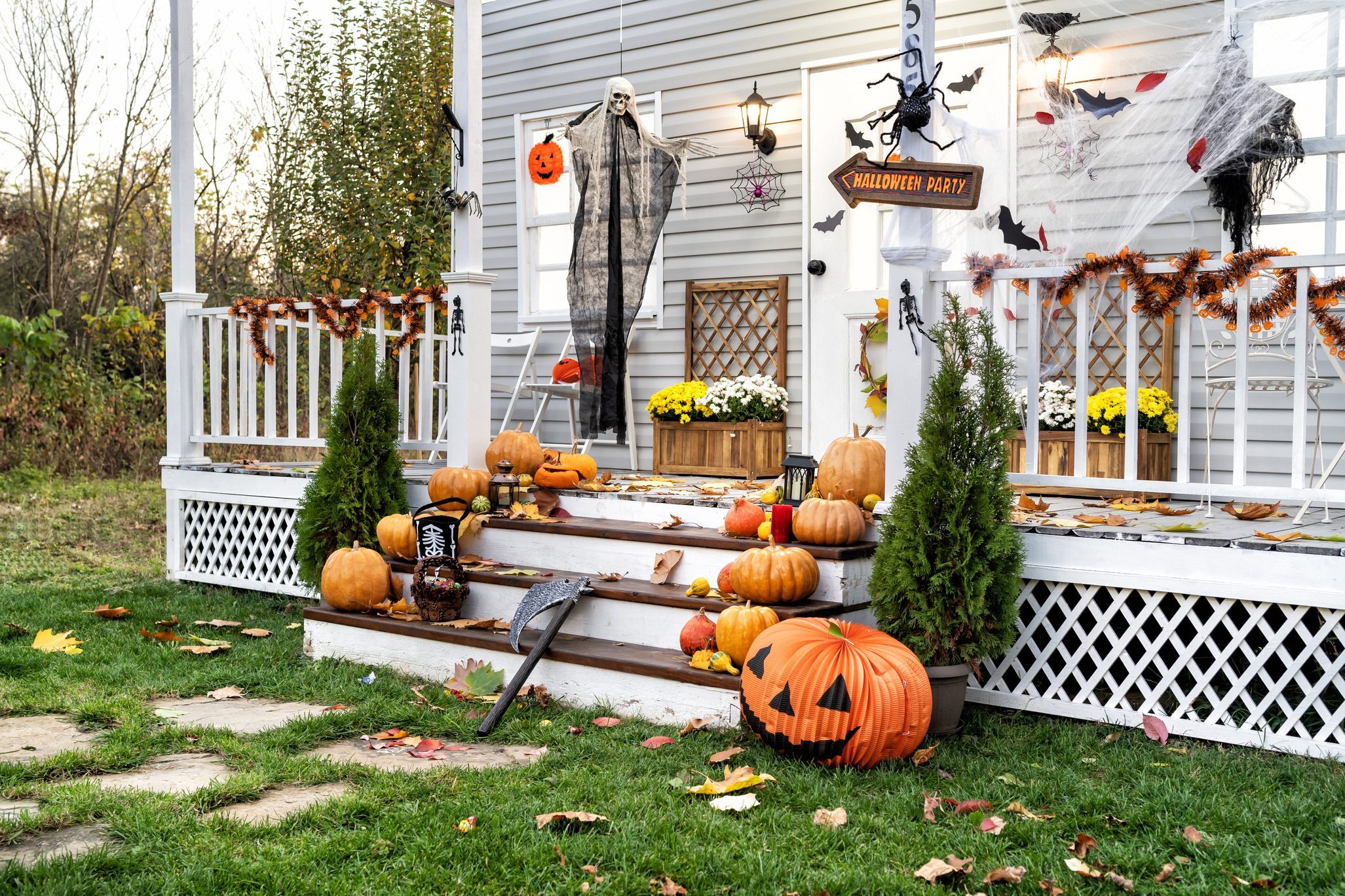Halloween Jack-o-Lantern Pumpkins on a porch stairs