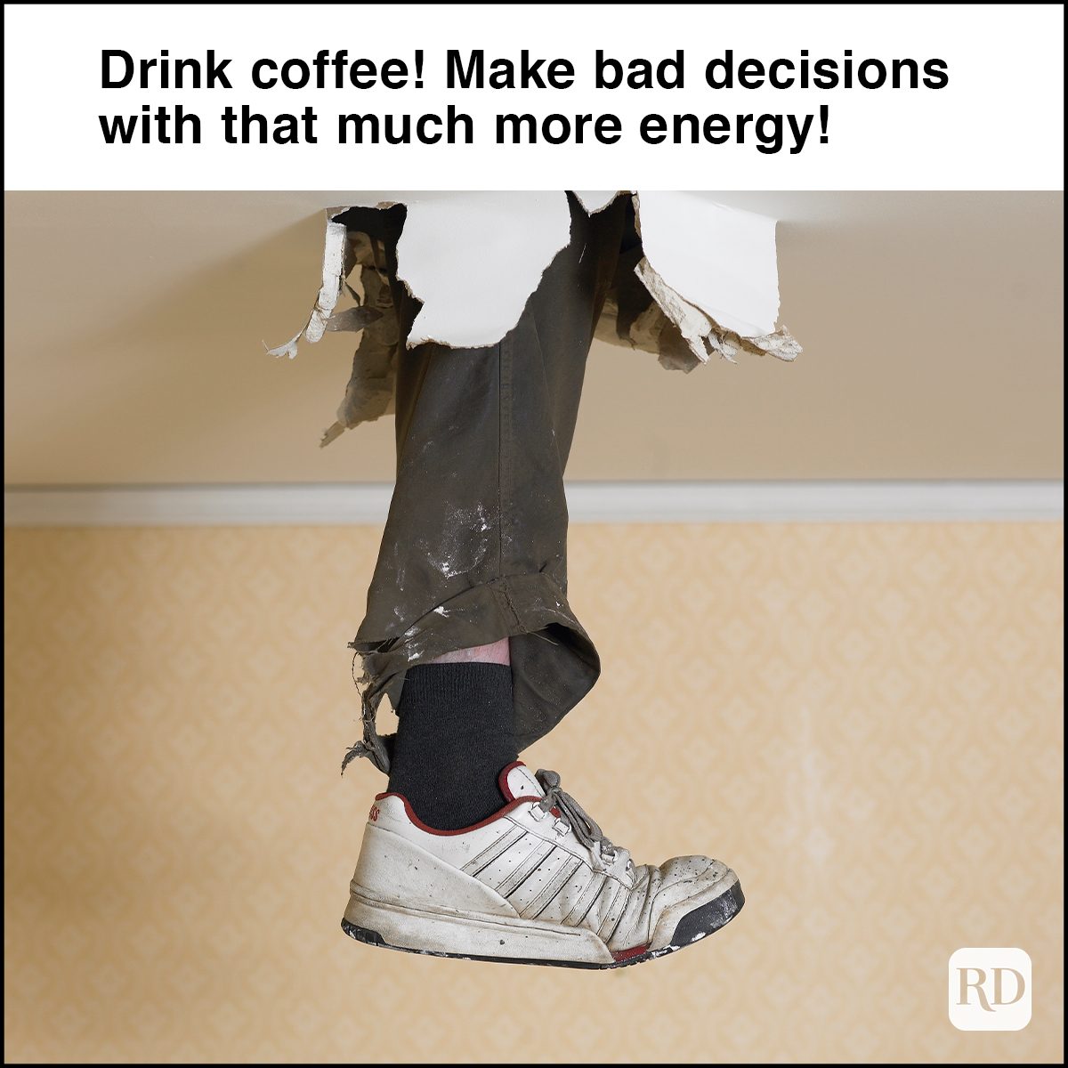 Human leg dangling from hole in ceiling 