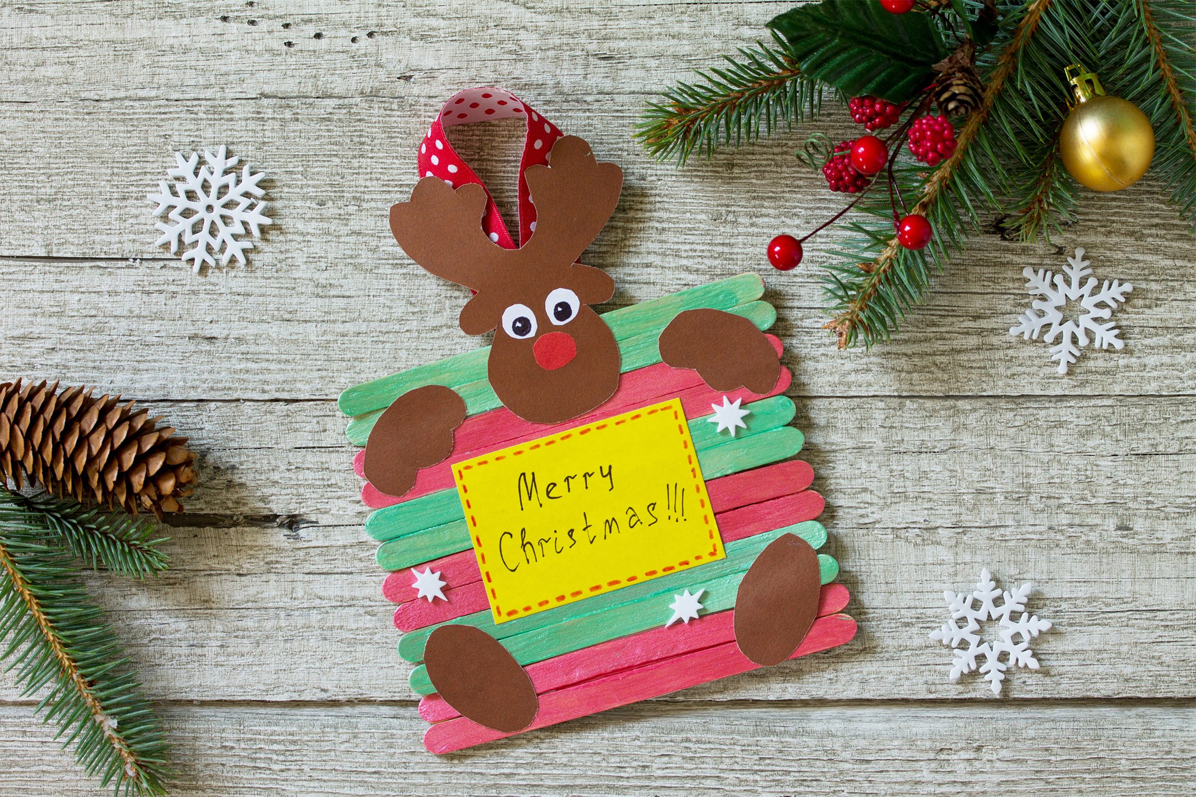 Reindeer stick gift on wooden table
