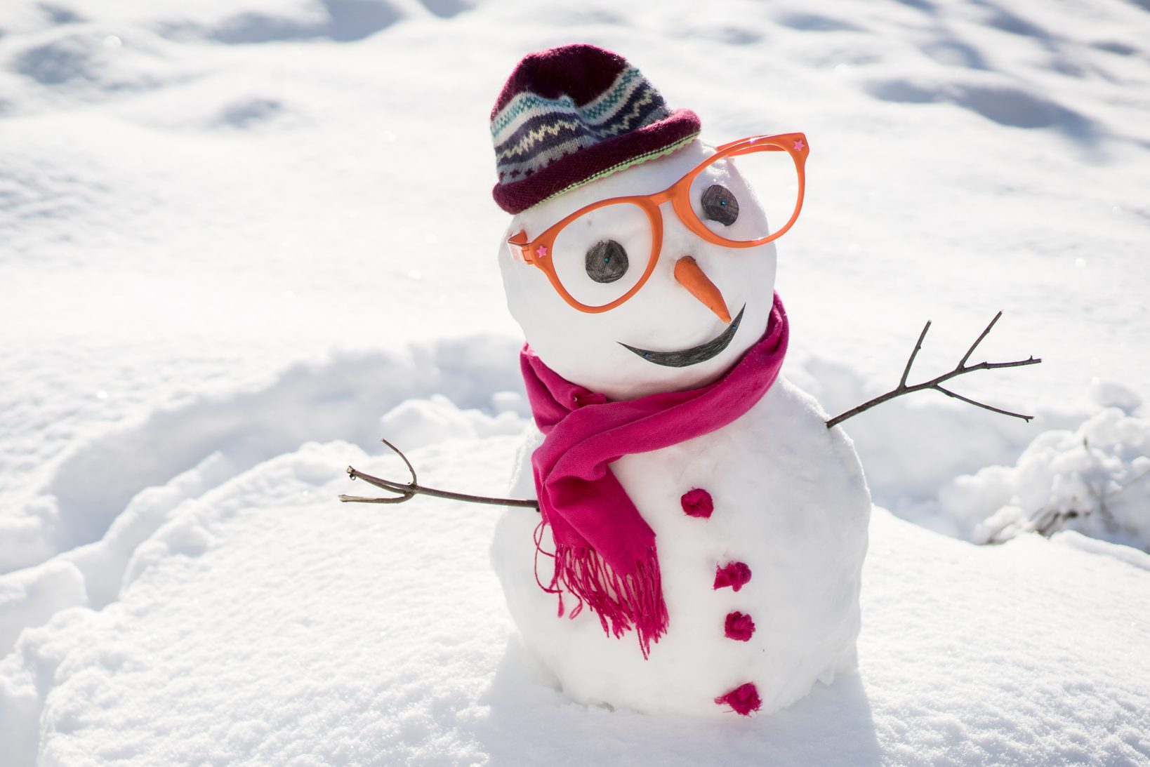 Winter snowman on snow
