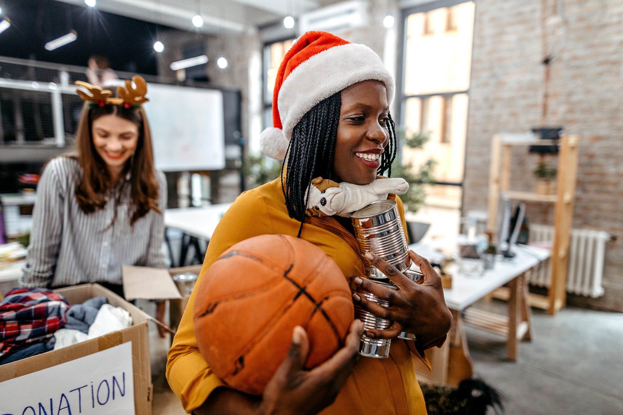 young woman volunteering and collecting donations