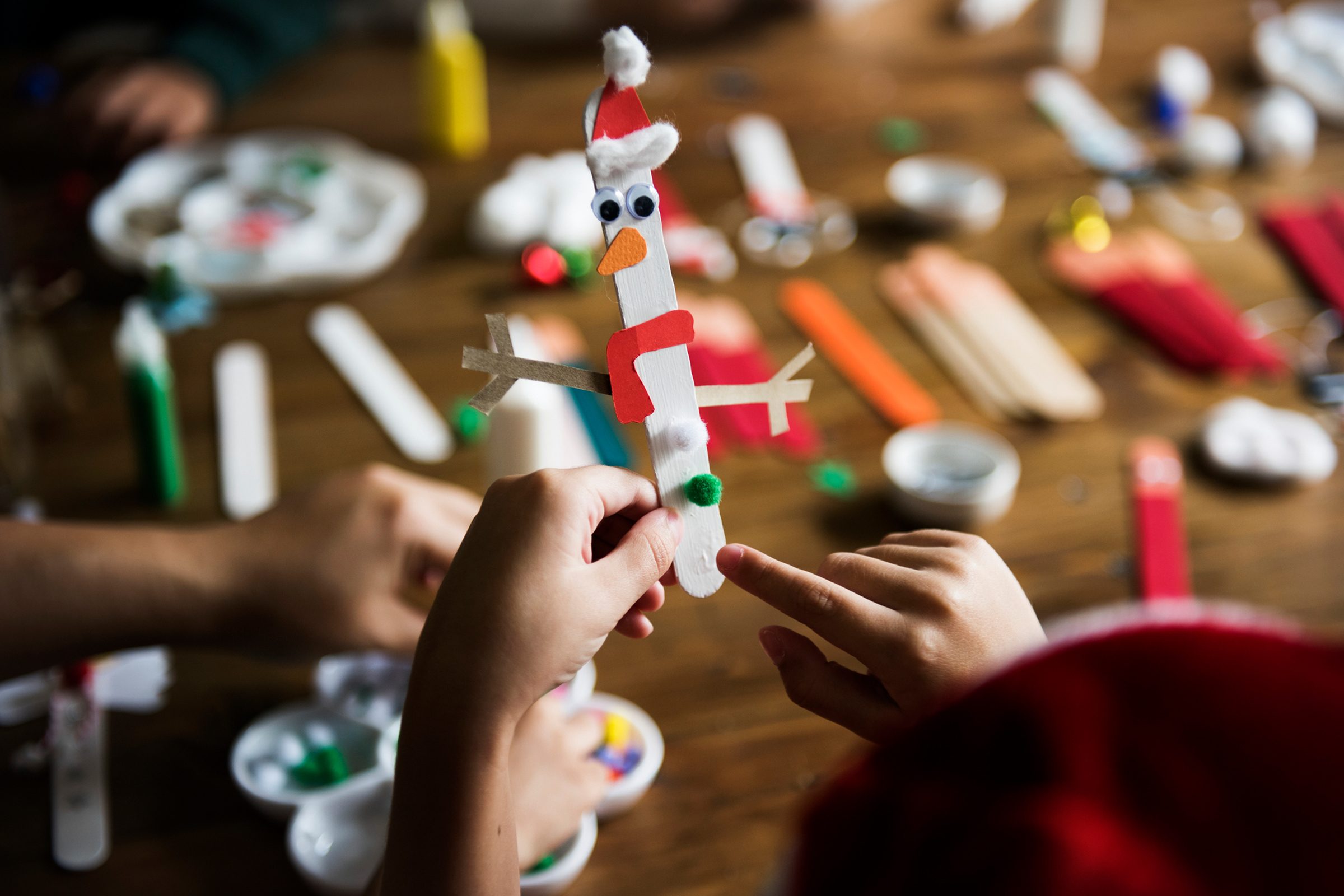 Snowman made on a popsicle stick