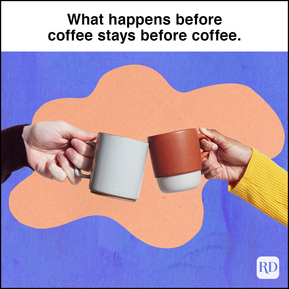 two coffee mugs touching