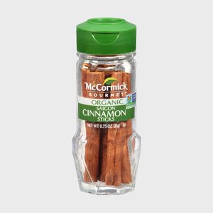 Glass jar contains cinnamon sticks, labeled 