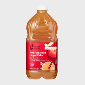Bottle displays apple cider label, promoting 