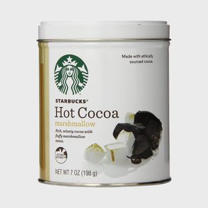 Canister displays Starbucks Hot Cocoa with marshmallow, featuring cocoa beans and marshmallows. Text highlights ethically sourced cocoa.
