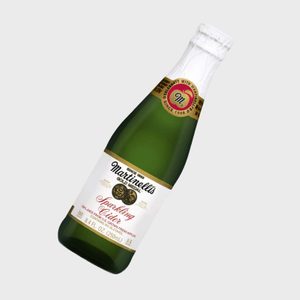 A green bottle of Martinelli's sparkling cider labeled 