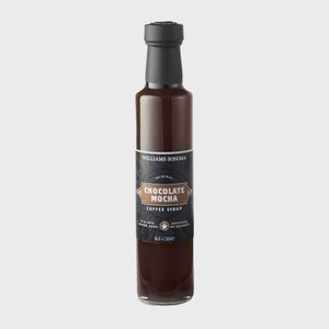 Glass bottle holds chocolate mocha syrup, labeled 