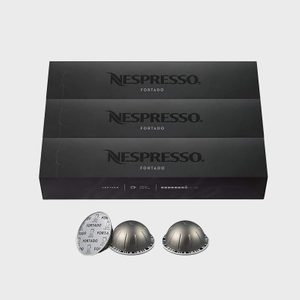 Three Nespresso Fortado boxes, grey coffee pods displayed in front, arranged orderly against a plain background.