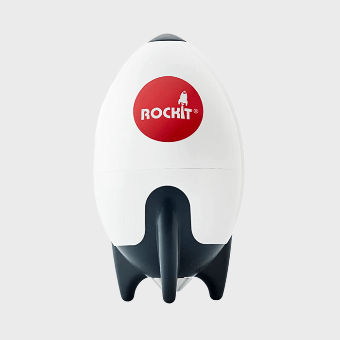 Rocket-shaped device stands upright; labeled 