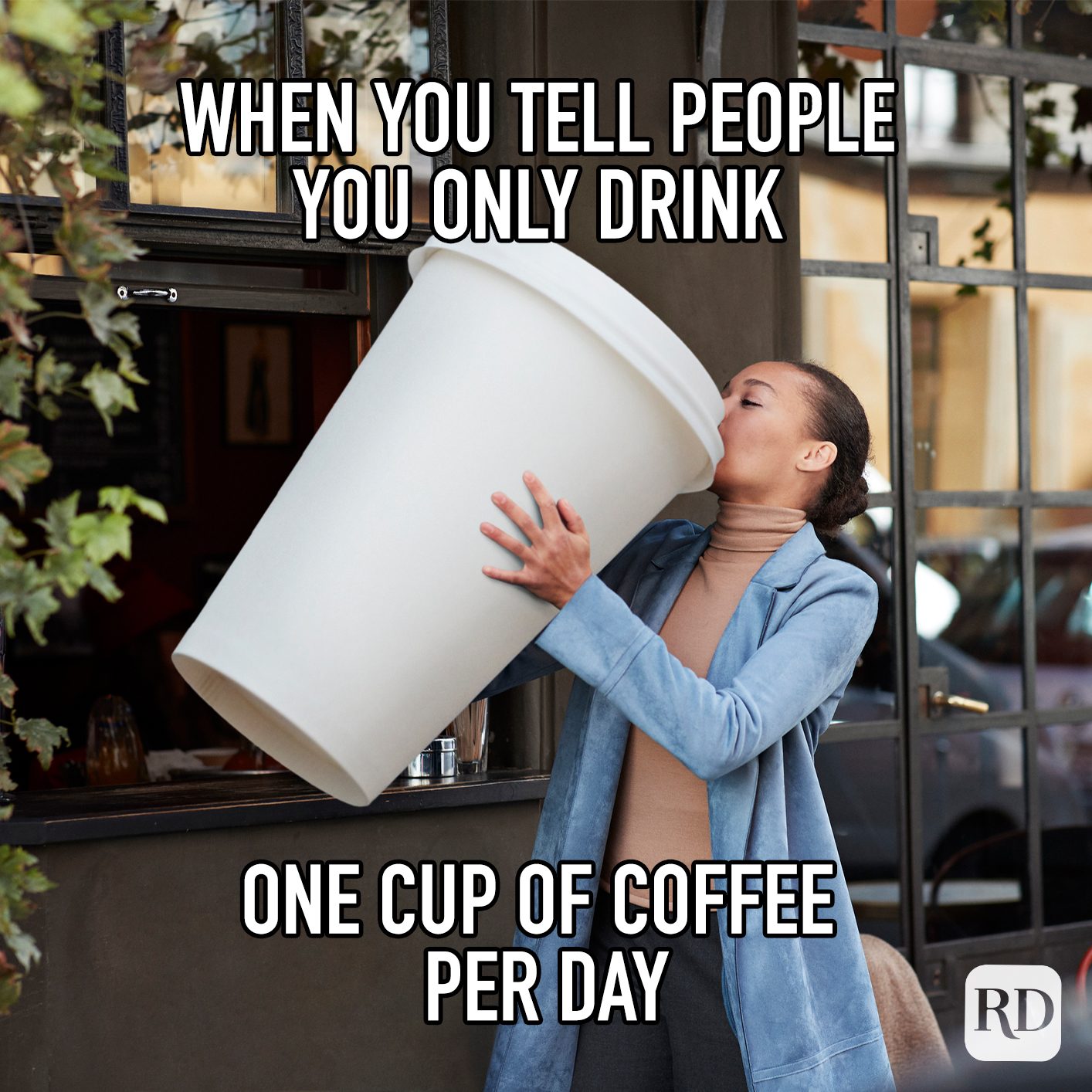 When You Tell People You Only Drink One Cup Of Coffee Per Day meme text over image of woman drinking from a giant coffee cup